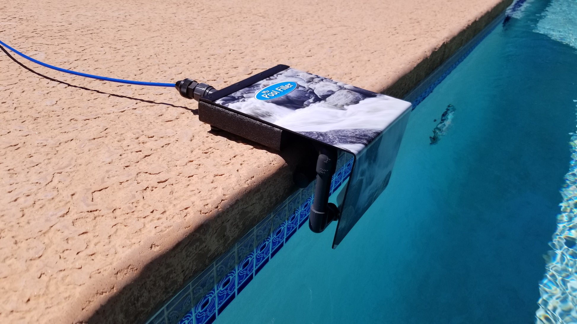 photo of My Pool Filler's in-ground swimming pool water leveler and maintainer installed and working